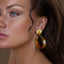 statement bijoux earrings gold woman amber