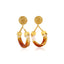 statement gold earrings woman amber