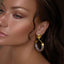 statement gold pearl earrings shimmering hoops